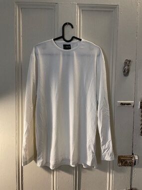 Cuts Clothing split hem long sleeved tshirt